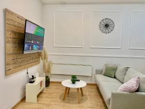 Televízia a/alebo spoločenská miestnosť v ubytovaní Croatia_Zagreb Apartment
