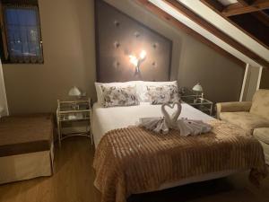 A bed or beds in a room at Posada Cicero