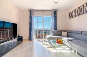 Et tv og/eller underholdning på Arco Iris Duplex Ocean View PH09