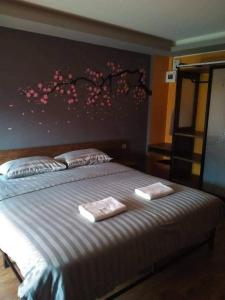 Postel nebo postele na pokoji v ubytování Nangnon Hill Hug Hotel