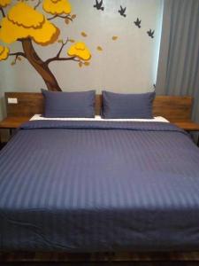 Postel nebo postele na pokoji v ubytování Nangnon Hill Hug Hotel