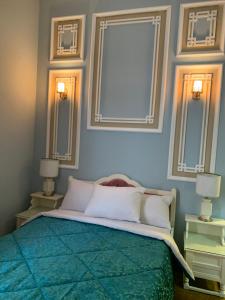 Ένα ή περισσότερα κρεβάτια σε δωμάτιο στο Cosmopolitan hotel