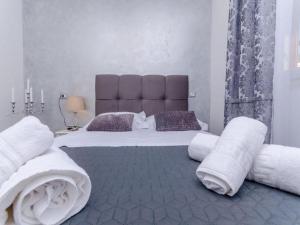 Postel nebo postele na pokoji v ubytování Villa Antica