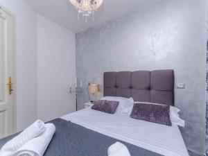 Postel nebo postele na pokoji v ubytování Villa Antica