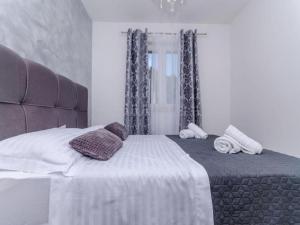 Postel nebo postele na pokoji v ubytování Villa Antica