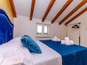 Postel nebo postele na pokoji v ubytování Villa Antica