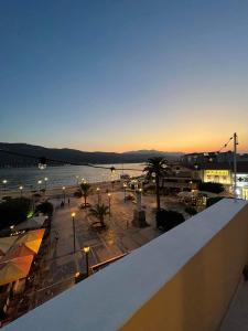a view of a city with a river and a street at Plateia sea view loft in Samos