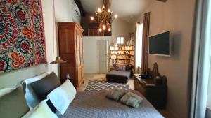 Posteľ alebo postele v izbe v ubytovaní Le Complot : Maison privée en plein coeur d'Avignon