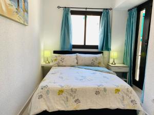 Posteľ alebo postele v izbe v ubytovaní Beach Bungalow Holiday Home
