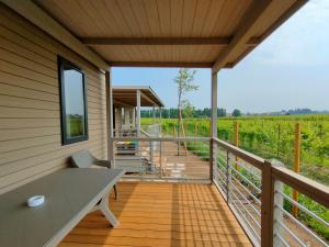 A balcony or terrace at Garda Di Vino Agricamping & Wine Shop Lazise