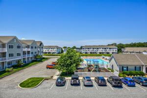 an aerial view of a parking lot at a apartment complex at Grande at Canal Pointe 37315 Trent Ct in Rehoboth Beach