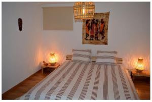 Ένα ή περισσότερα κρεβάτια σε δωμάτιο στο Appartement lumineux et spacieux à Charmey - Coin de paradis