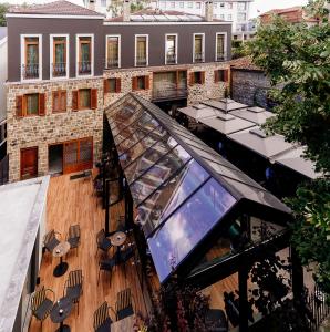 an overhead view of a building with a glass roof at Vecchia Boutique Hotel in Korçë