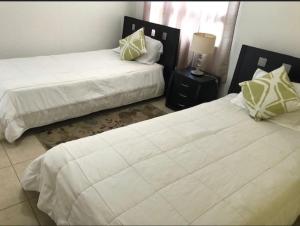 Beautiful apartment, privileged location El Cangrejo tesisinde bir odada yatak veya yataklar