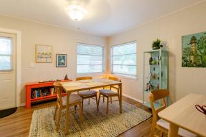 a dining room with a table and chairs at Relax at Renellie in Tampa