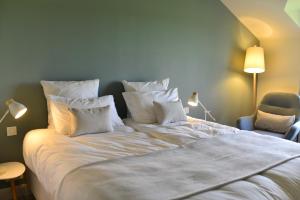 Postel nebo postele na pokoji v ubytování B&B Entre Champs