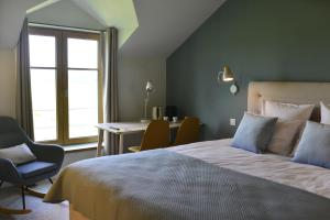 Postel nebo postele na pokoji v ubytování B&B Entre Champs