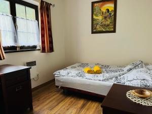 Postel nebo postele na pokoji v ubytování Apartmán Olívia 8 Hrabovská dolina