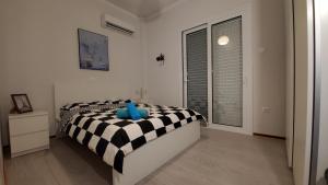Posteľ alebo postele v izbe v ubytovaní Armenian Huts - Beach Apartments