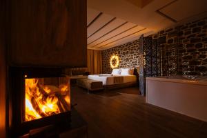 Postel nebo postele na pokoji v ubytování Vecchia Boutique Hotel