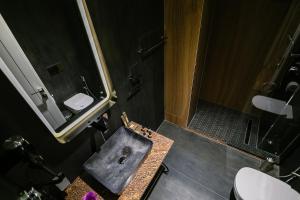 Koupelna v ubytování Vecchia Boutique Hotel