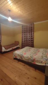 Ένα ή περισσότερα κρεβάτια σε δωμάτιο στο Tsknari Oda