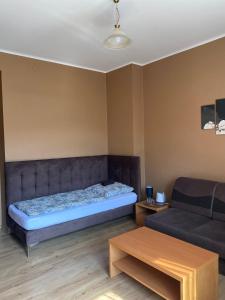 Łóżko lub łóżka w pokoju w obiekcie Zajazd Kadar