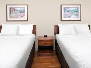 Voodi või voodid majutusasutuse Extended Stay America Select Suites - Phoenix - West toas