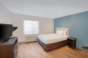 Krevet ili kreveti u jedinici u objektu Extended Stay America Select Suites - Phoenix - North