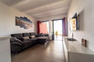 A television and/or entertainment centre at Casa Martín.