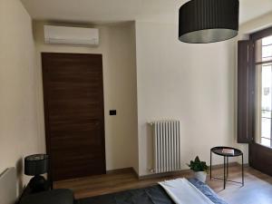 Posteľ alebo postele v izbe v ubytovaní Domus Acaja