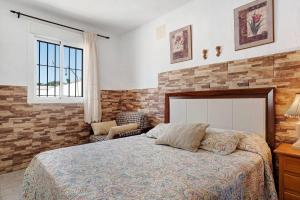 Postel nebo postele na pokoji v ubytování Casa Mari Loli 2 + 19 fotografií