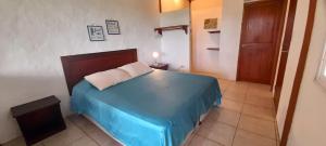 Letto o letti in una camera di Hosteria Guachapeli