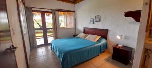 Letto o letti in una camera di Hosteria Guachapeli