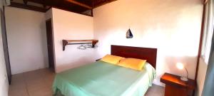 Letto o letti in una camera di Hosteria Guachapeli