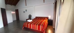 Letto o letti in una camera di Hosteria Guachapeli