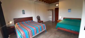 Letto o letti in una camera di Hosteria Guachapeli