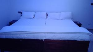 Postel nebo postele na pokoji v ubytování Mscb guest house