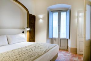 Posteľ alebo postele v izbe v ubytovaní Can Mascort Eco Hotel