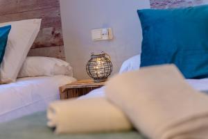 Posteľ alebo postele v izbe v ubytovaní Boutique Apartment Center Granada