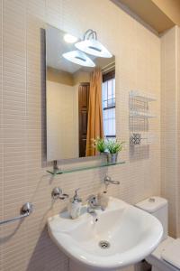 Kúpeľňa v ubytovaní Boutique Apartment Center Granada + 18 fotografií