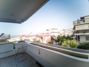 Uma varanda ou terraço em 山脚下，舒适温馨海景公寓