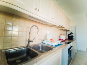 A cozinha ou kitchenette de 山脚下，舒适温馨海景公寓