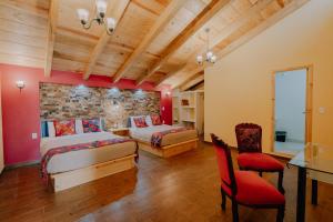 Postel nebo postele na pokoji v ubytování Hotel Cielo y Selva, San Cristobal de las Casas