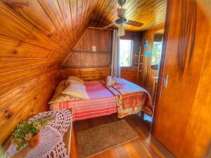 Cama ou camas em um quarto em Pousada Colibri Serrano