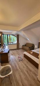 Postel nebo postele na pokoji v ubytování M7 Villa Bed& Bistro