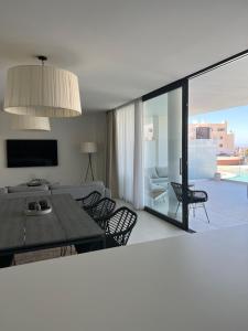 A seating area at New apartment in Higueron West
