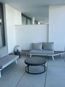 A seating area at New apartment in Higueron West