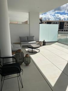 A balcony or terrace at New apartment in Higueron West