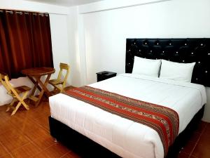 Letto o letti in una camera di Hostal Cusco de mis Sueños